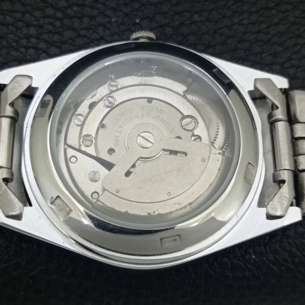 Vintage 1974 Seiko Automatic Mens Silver Watch W/daydate & Green accents